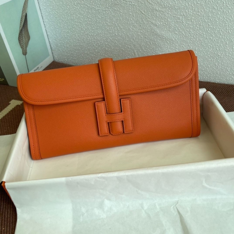 H**mes clutch bags
